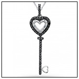 Samuels Jewelers Black and White Diamond Key Pendant!